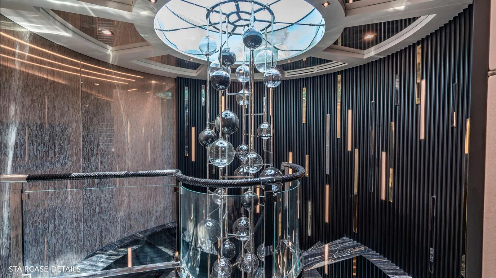 a room with a chandelier and a chandelier aboard MOONRAKER Yacht for Sale
