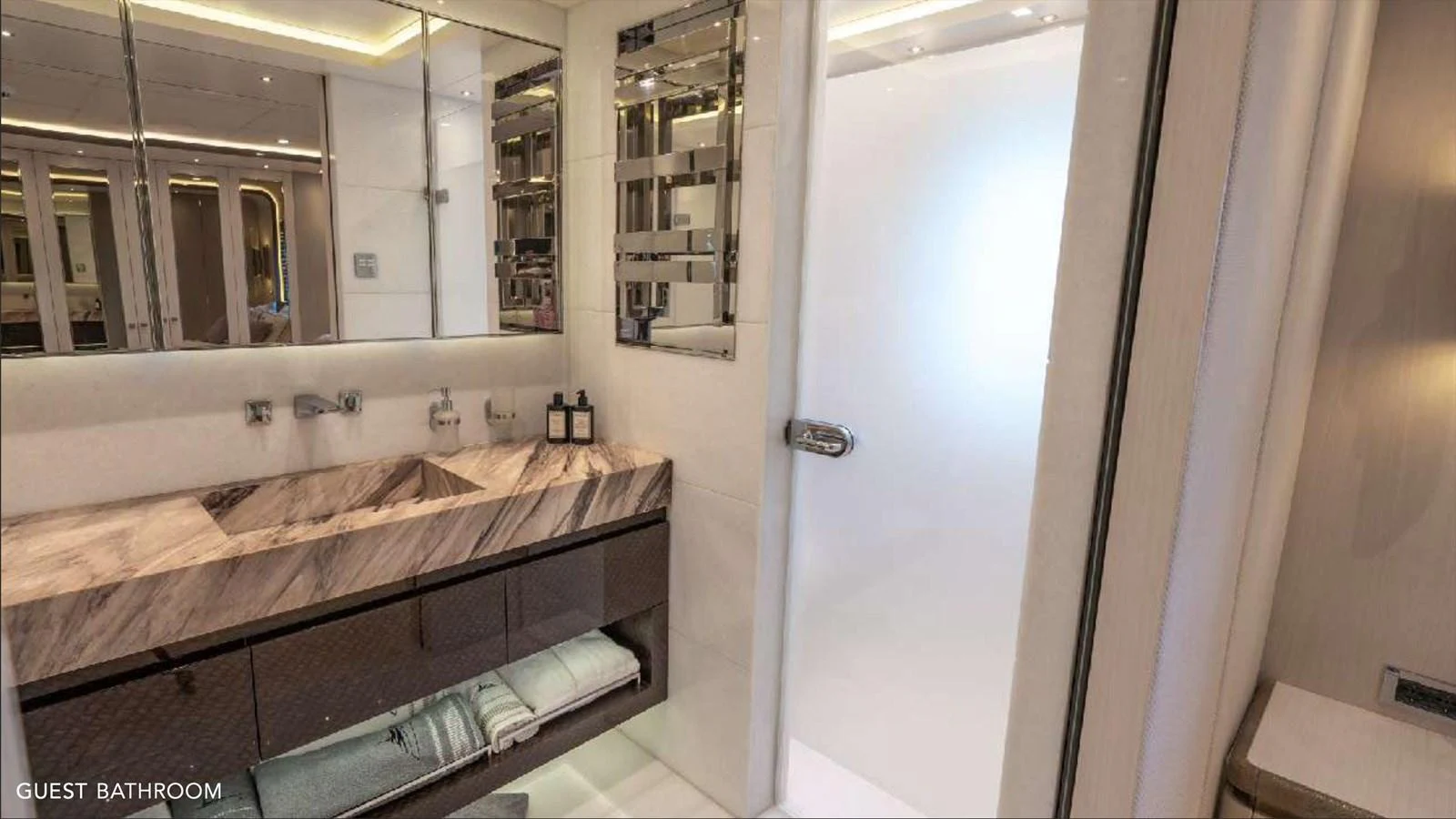 a bathroom with a large countertop aboard MOONRAKER Yacht for Sale