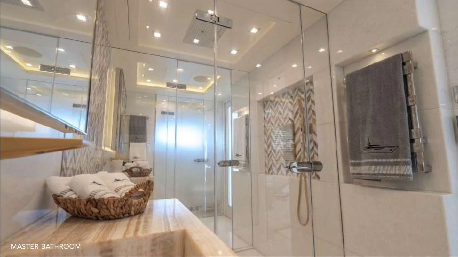 a bathroom with a large mirror aboard MOONRAKER Yacht for Sale