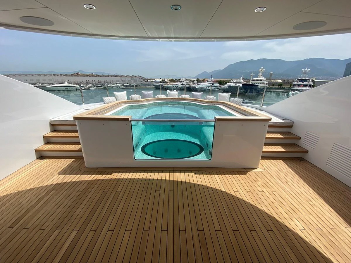 a swimming pool on a deck aboard MOONRAKER Yacht for Sale