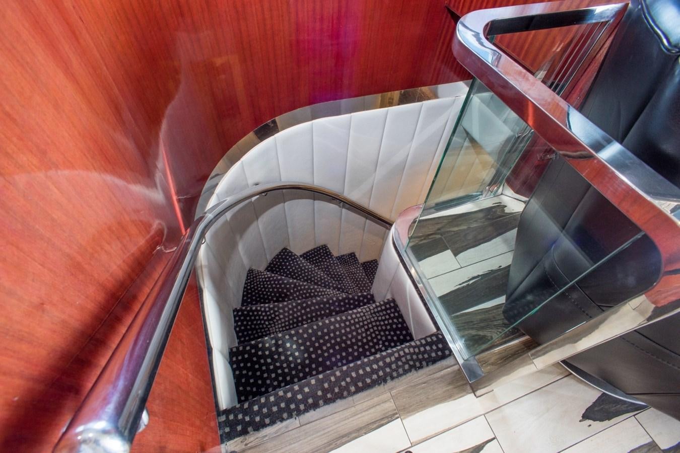 a chair with a rug on it aboard JACO Yacht for Sale