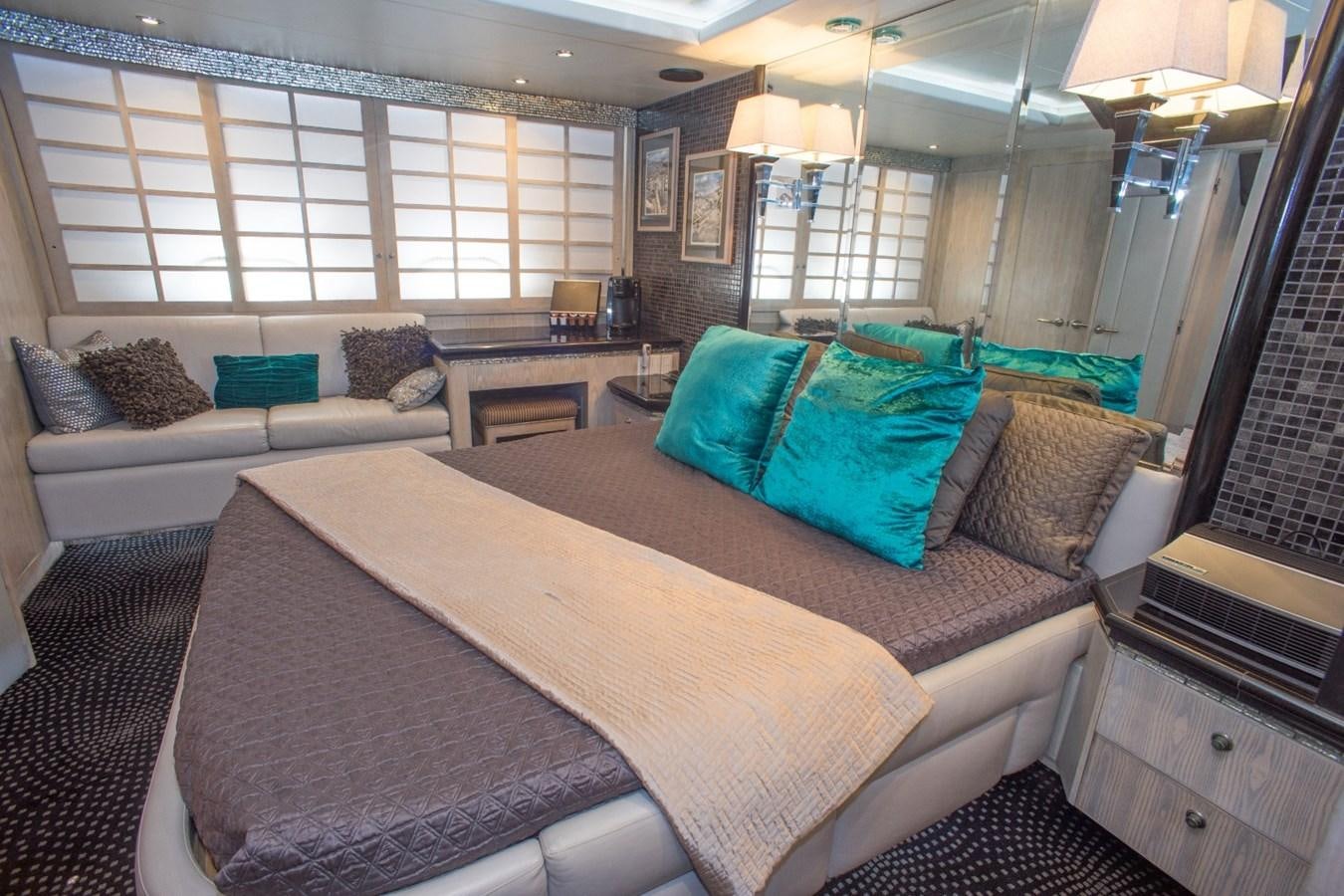 a large bed in a room aboard JACO Yacht for Sale