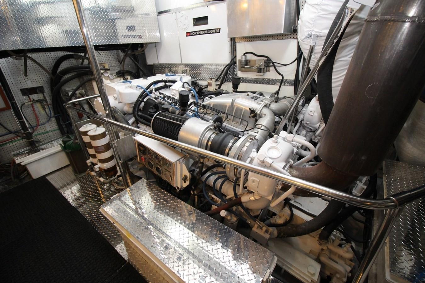 a machine with a large metal cylinder aboard JACO Yacht for Sale