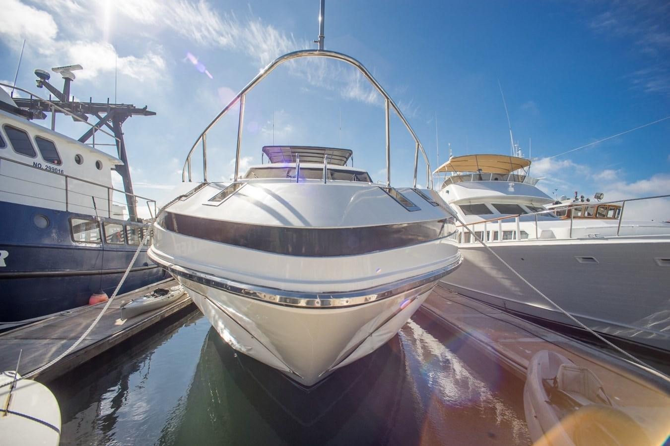 boats docked at a pier aboard JACO Yacht for Sale