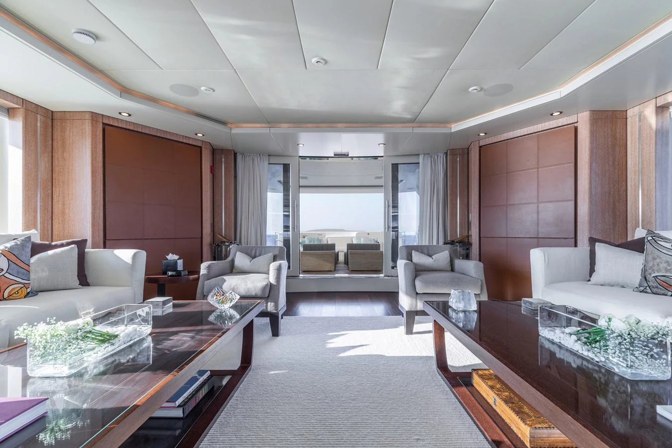 a living room with a large window aboard ROLA Yacht for Sale