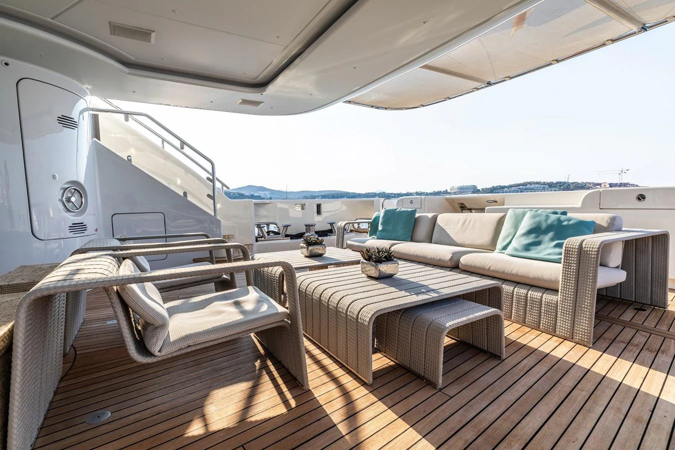 a boat with a bed and a couch aboard ROLA Yacht for Sale