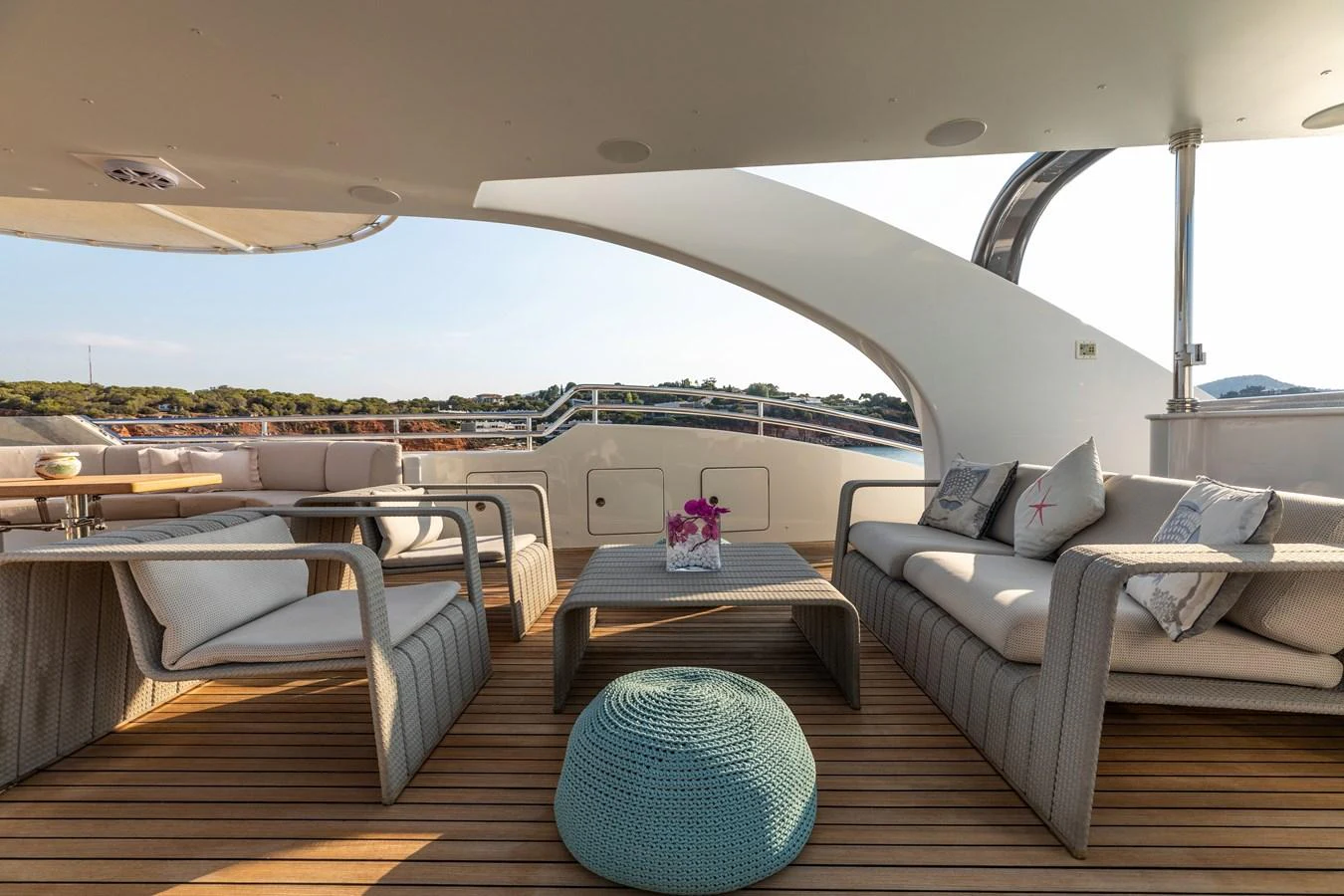 a boat with a table and chairs aboard ROLA Yacht for Sale