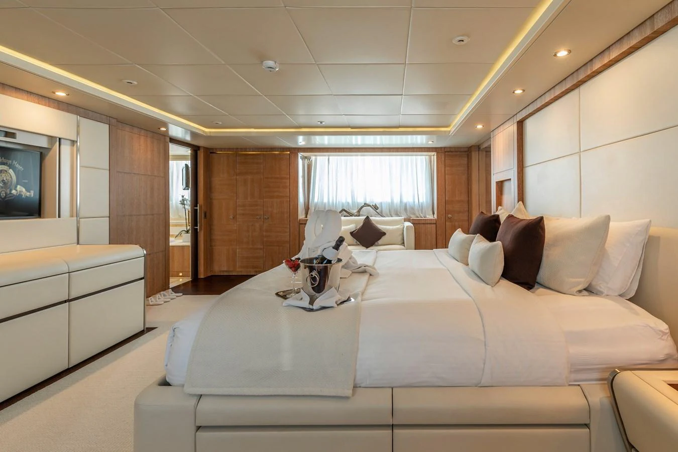 a large bed in a room aboard ROLA Yacht for Sale