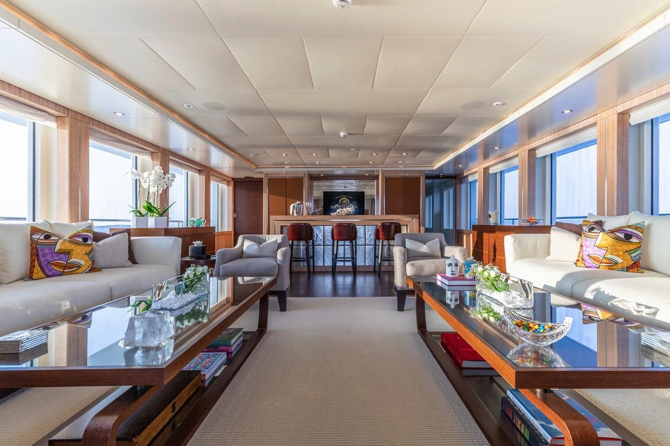 a living room with a large window aboard ROLA Yacht for Sale