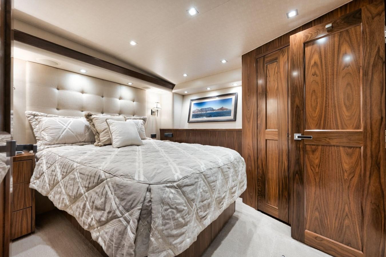 a bed in a room aboard MVP Yacht for Sale