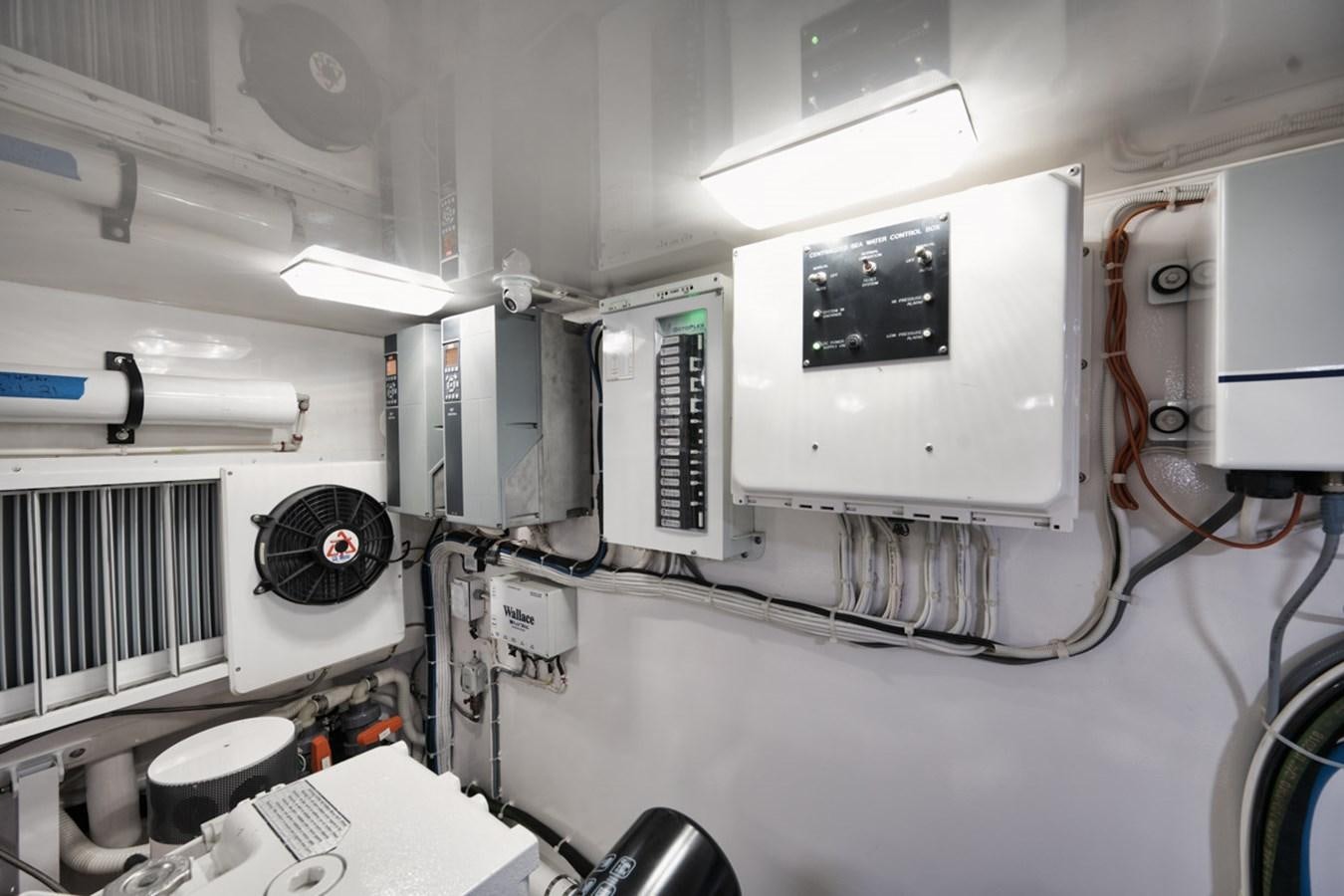 a room with machines and equipment aboard MVP Yacht for Sale