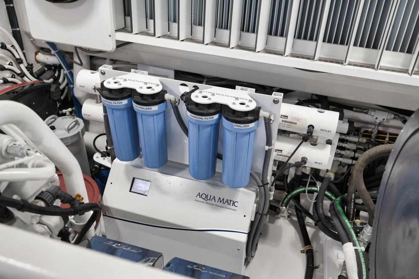 a machine with a large piece of equipment in it aboard MVP Yacht for Sale