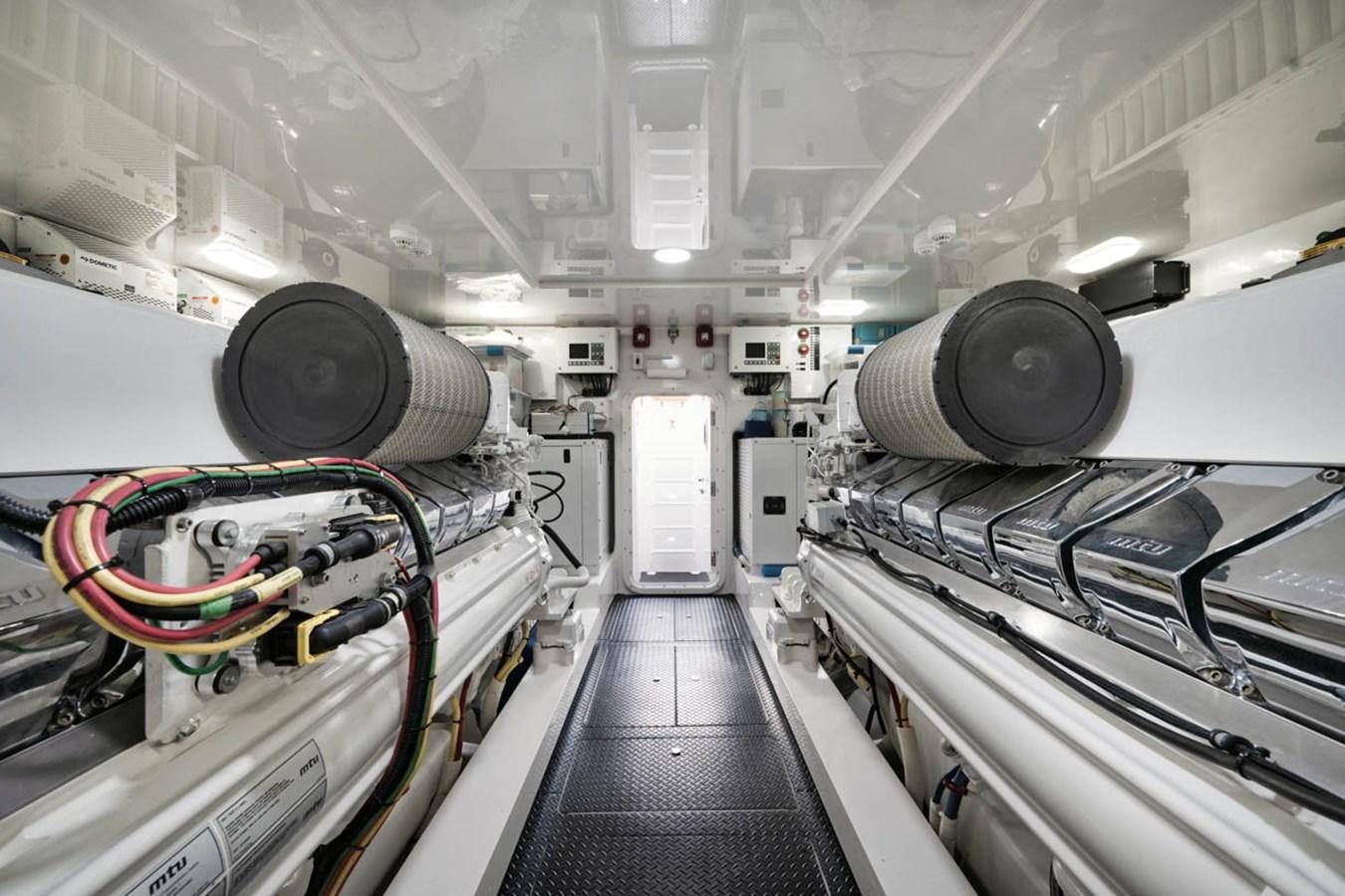 a large room with large machines aboard MVP Yacht for Sale