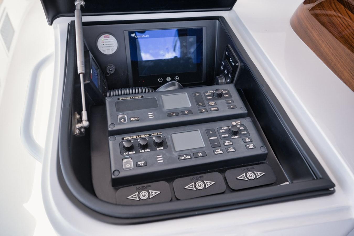 a black electronic device aboard MVP Yacht for Sale