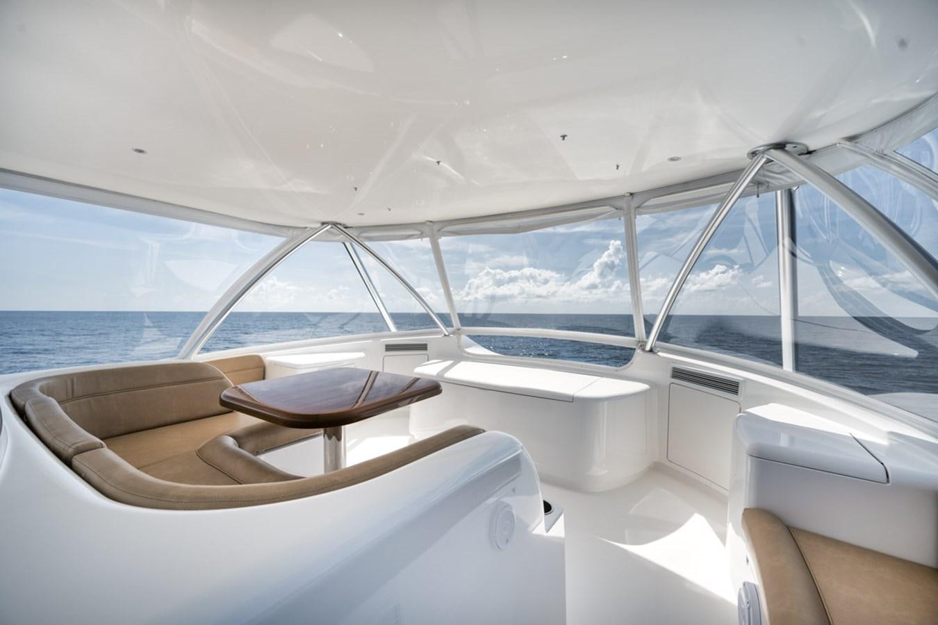 a boat with a view of the ocean and the ocean aboard MVP Yacht for Sale