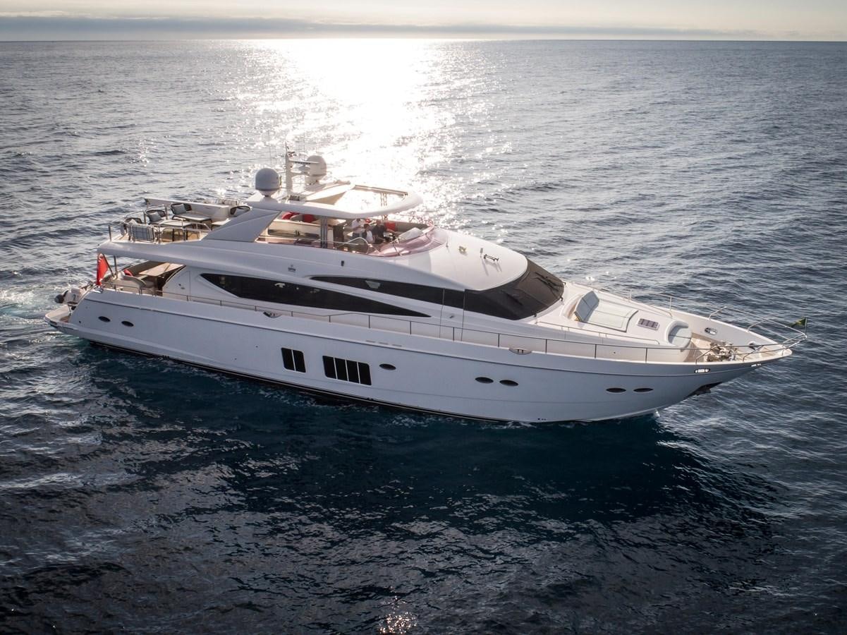 a white yacht in the water aboard ROSSO Yacht for Sale