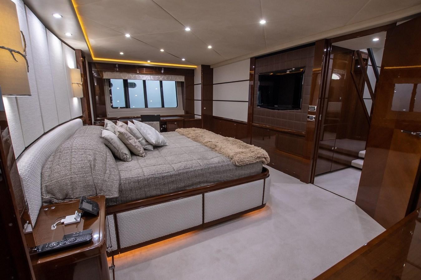 a bed in a room aboard ROSSO Yacht for Sale