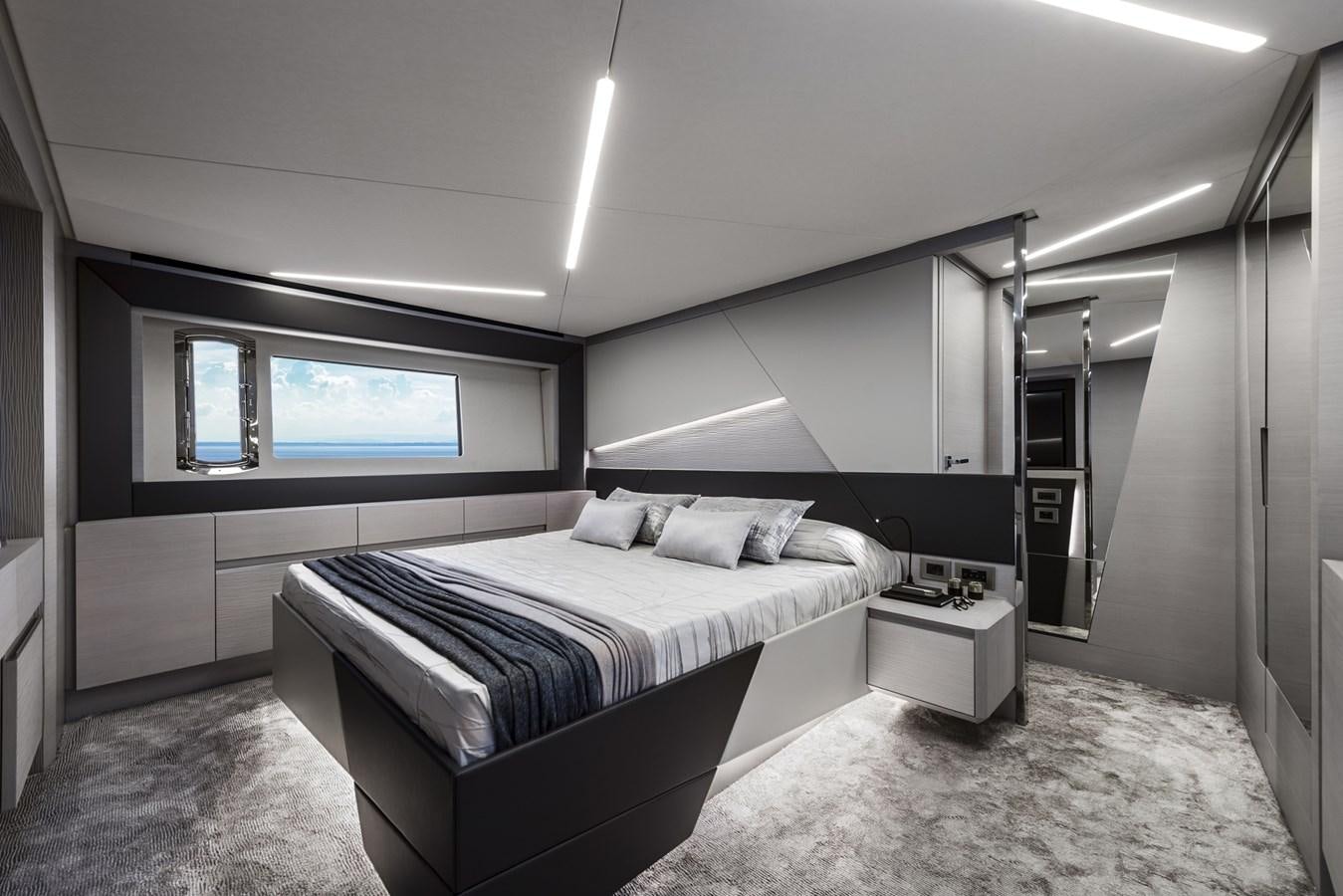 a bedroom with a bed aboard PERSHING 7X Yacht for Sale