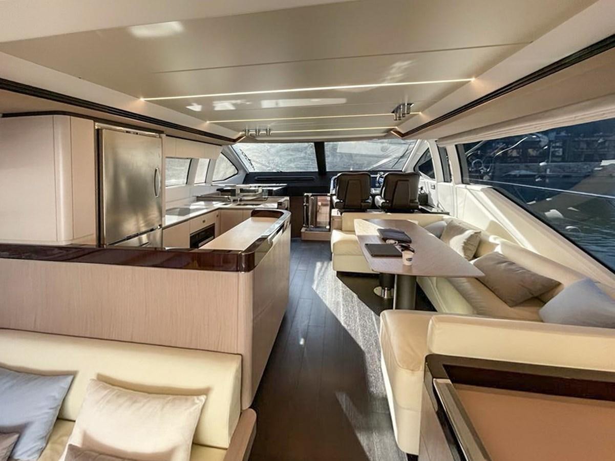 a room with a couch and a table aboard OOSA Yacht for Sale