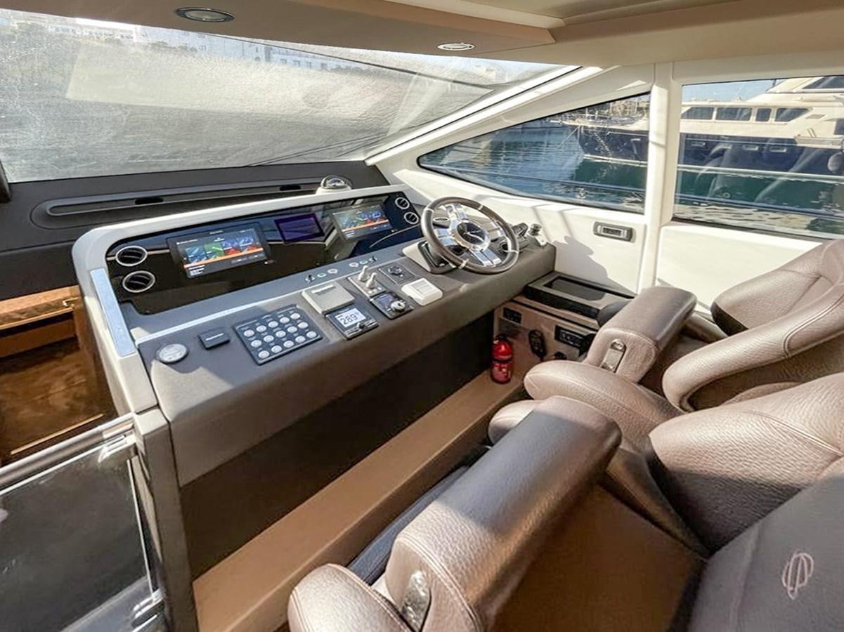 inside of a car aboard OOSA Yacht for Sale
