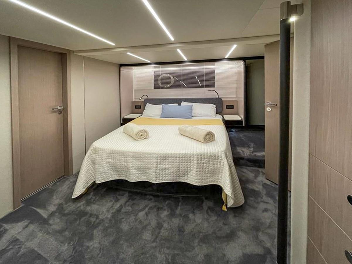 a bed in a room aboard OOSA Yacht for Sale