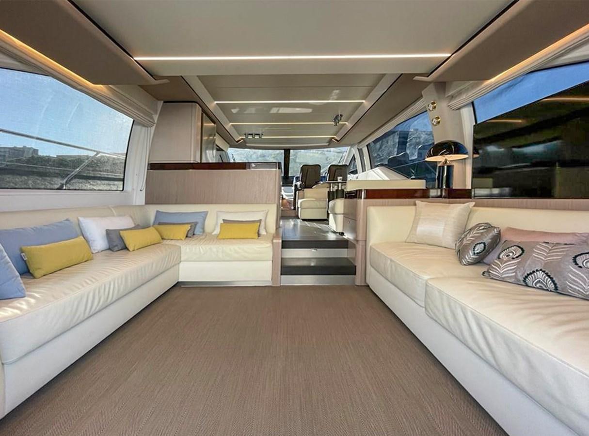 a room with a couch and a bed aboard OOSA Yacht for Sale