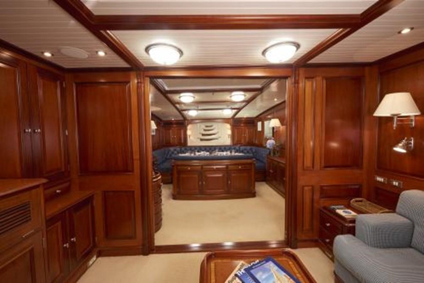 a room with a bed and a desk aboard BORKUMRIFF IV Yacht for Sale
