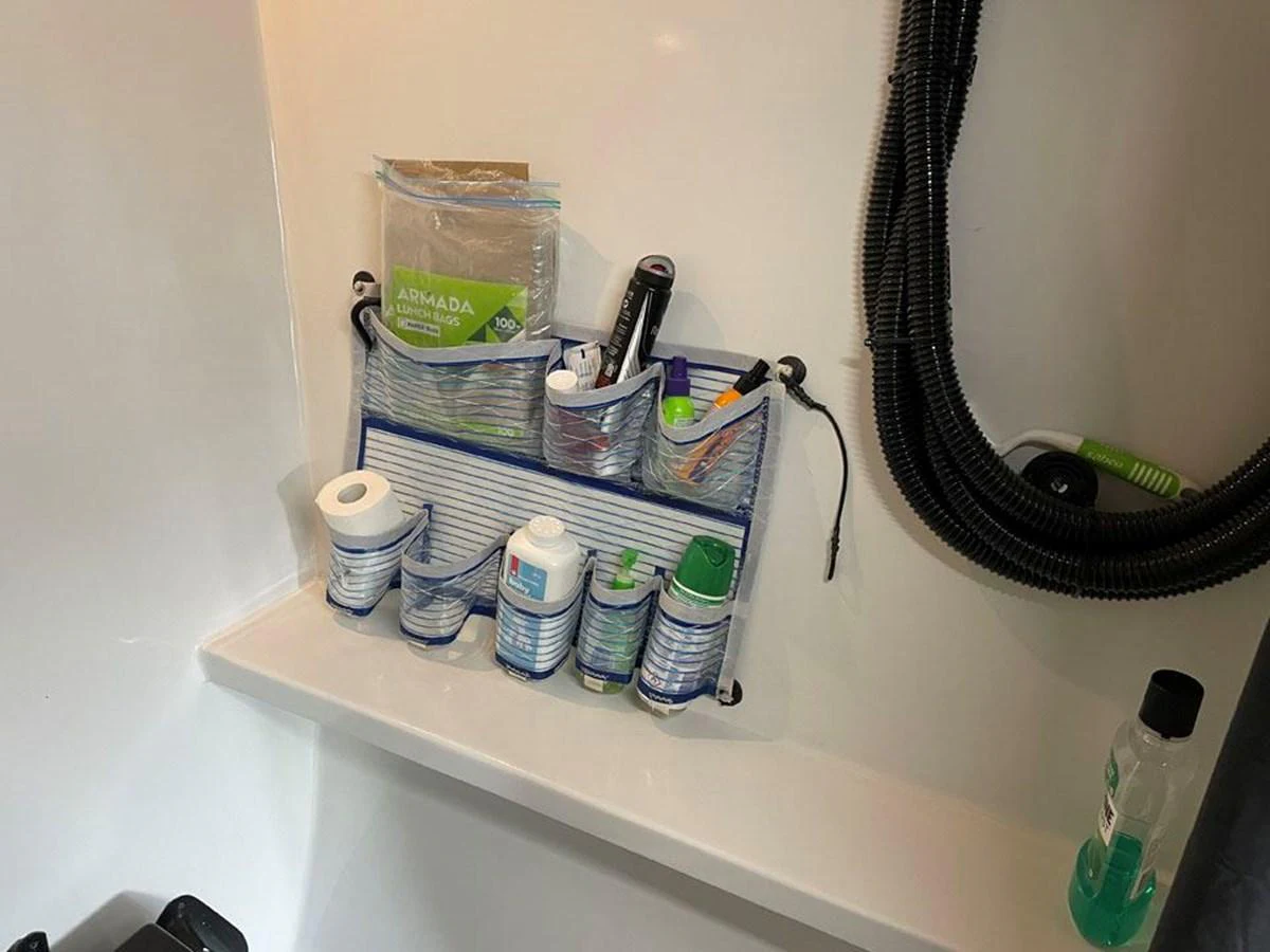 a shelf with a variety of items on it aboard BLACK JACK IV Yacht for Sale