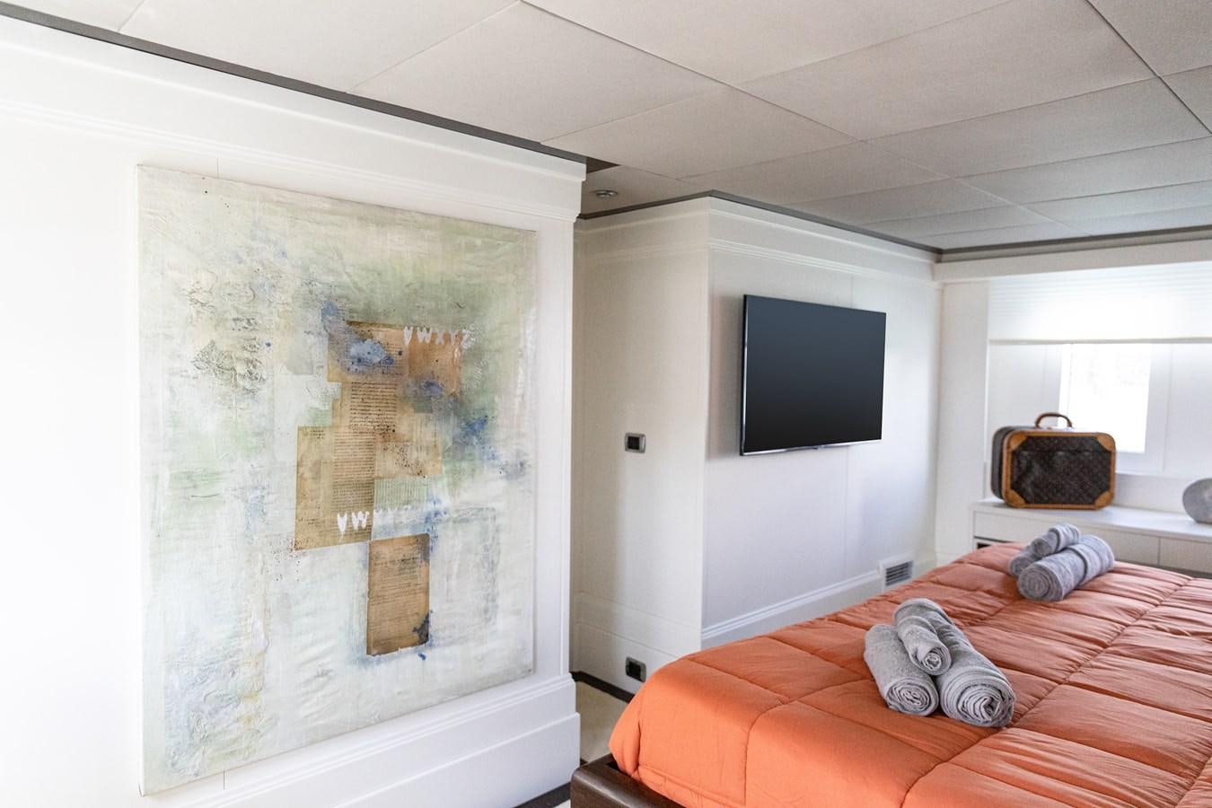 a living room with a large map on the wall aboard VEVEKOS Yacht for Sale