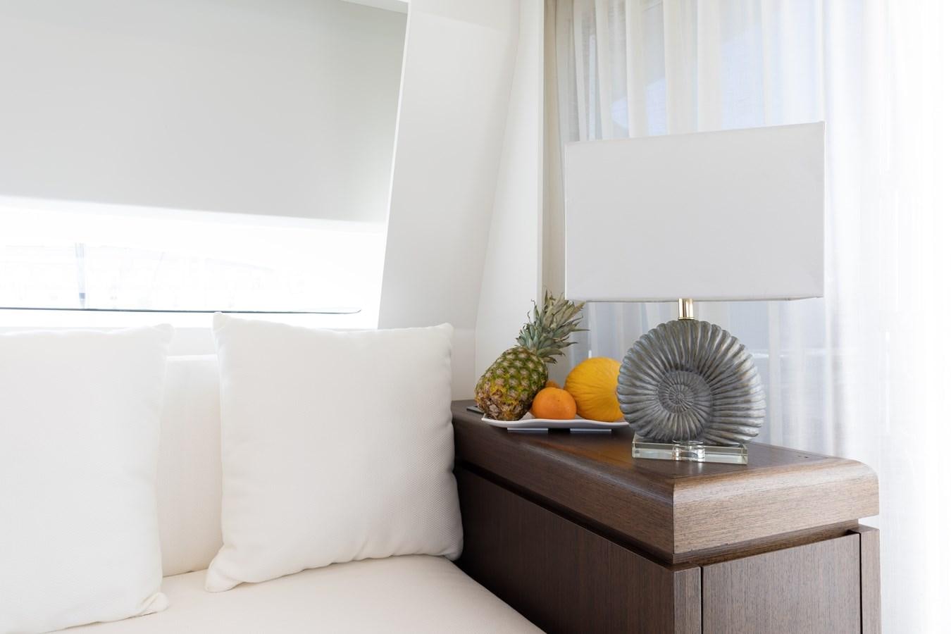 a table with fruit on it aboard VEVEKOS Yacht for Sale