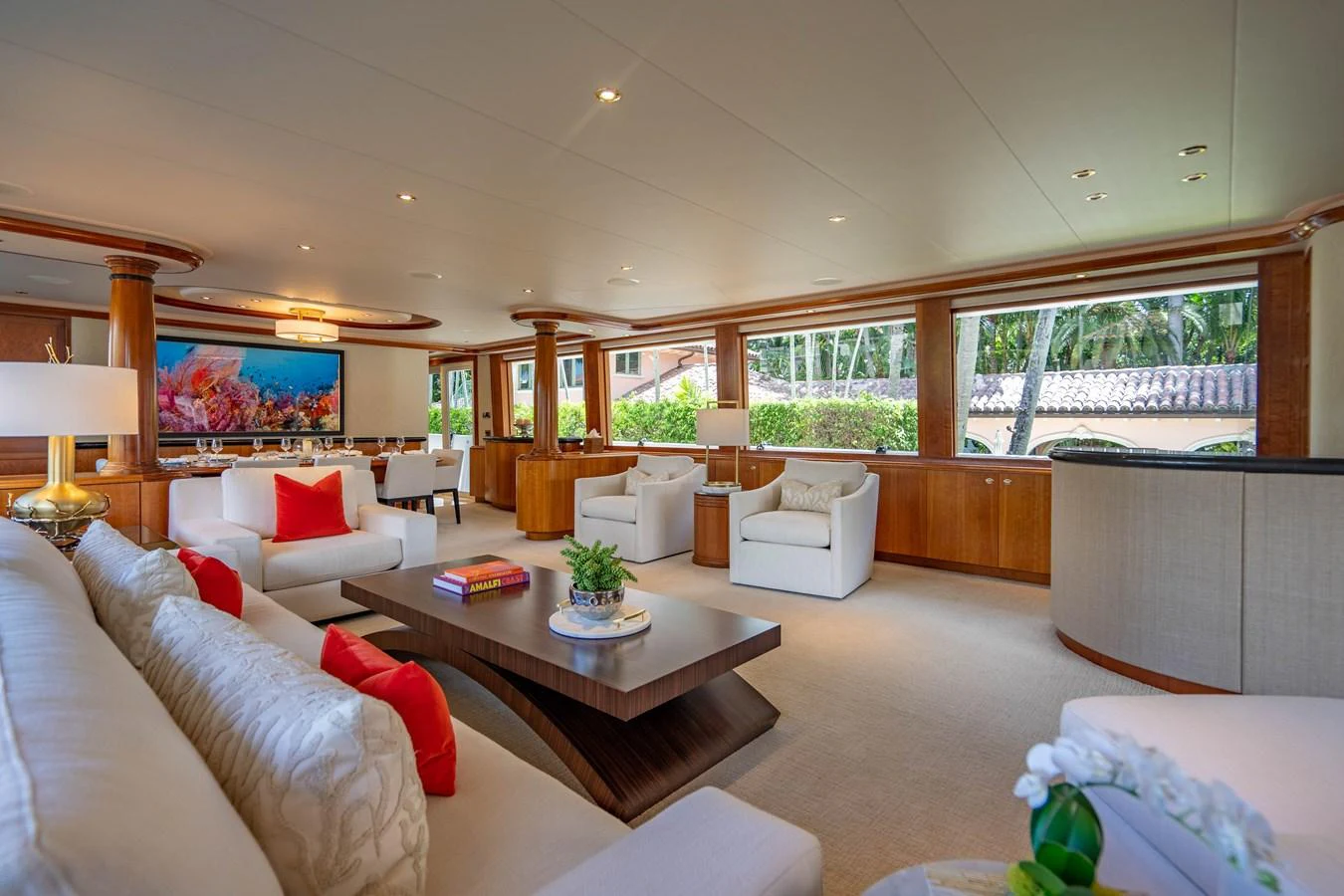 a living room with a large window aboard SEAQUEST Yacht for Sale