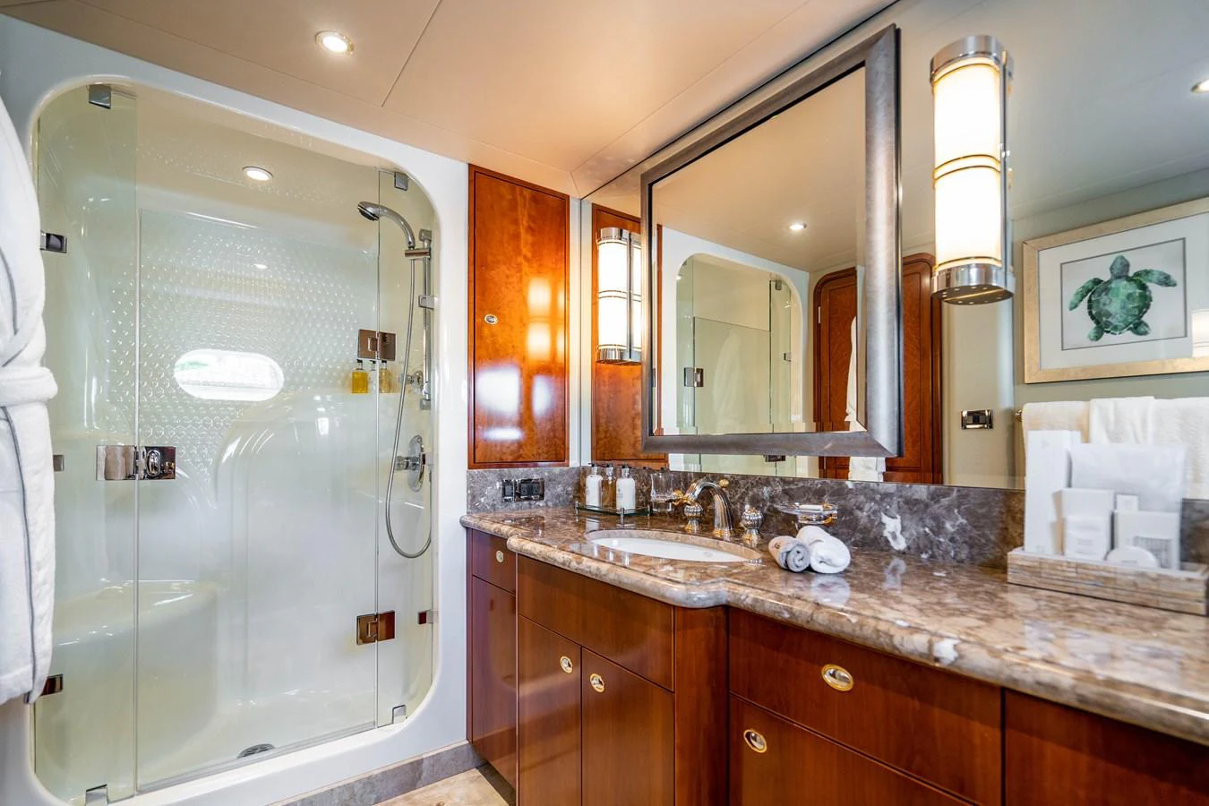 a bathroom with a glass shower aboard SEAQUEST Yacht for Sale