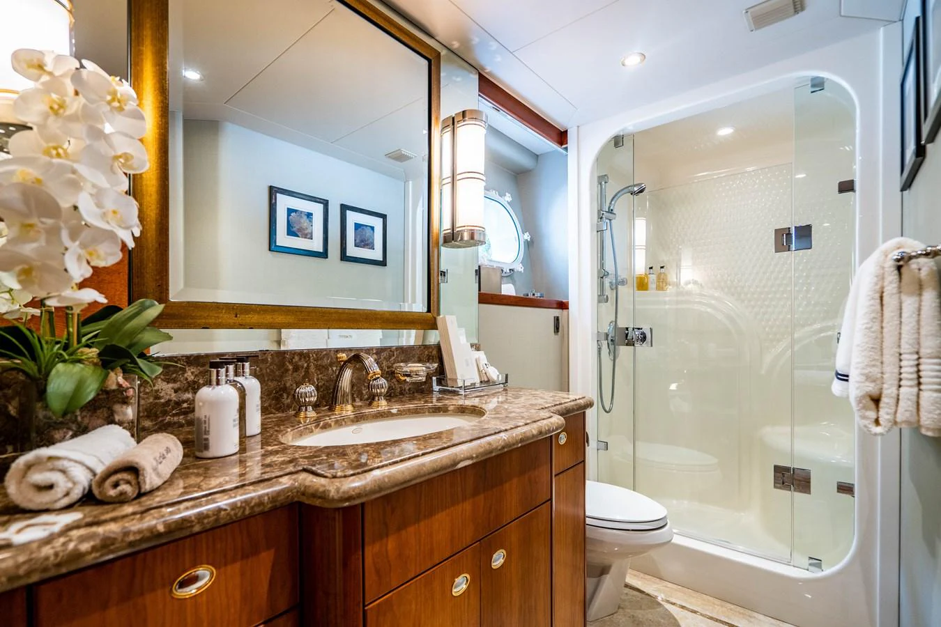 a bathroom with a sink and a shower aboard SEAQUEST Yacht for Sale
