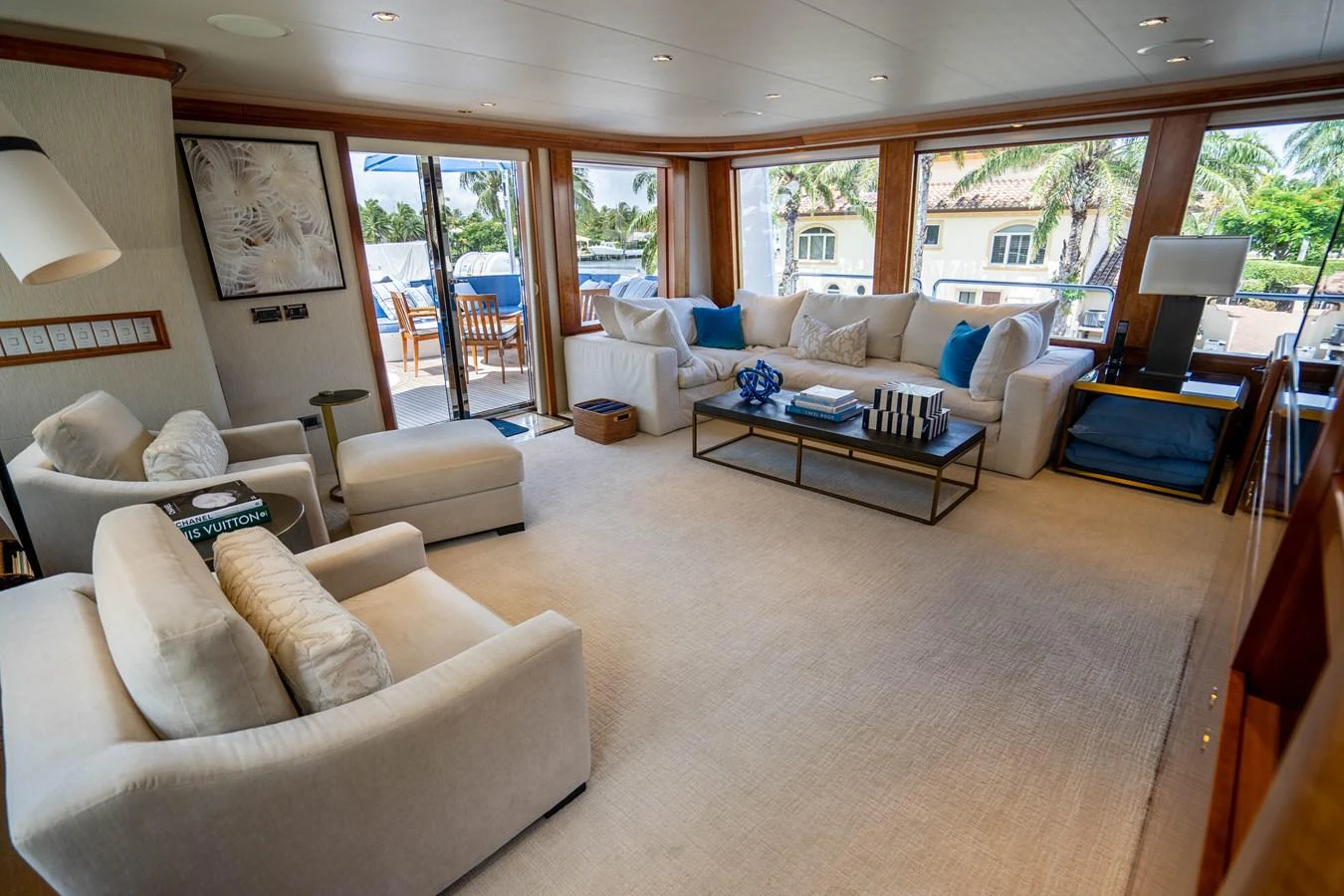 a living room with a large window aboard SEAQUEST Yacht for Sale