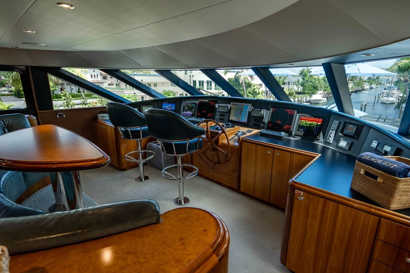 a room with a table and chairs aboard SEAQUEST Yacht for Sale
