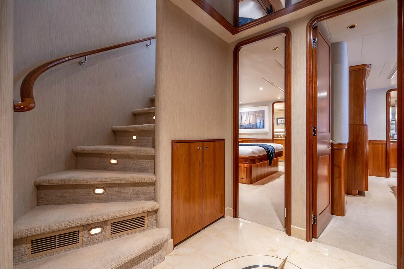 a room with a bed and a door aboard SEAQUEST Yacht for Sale