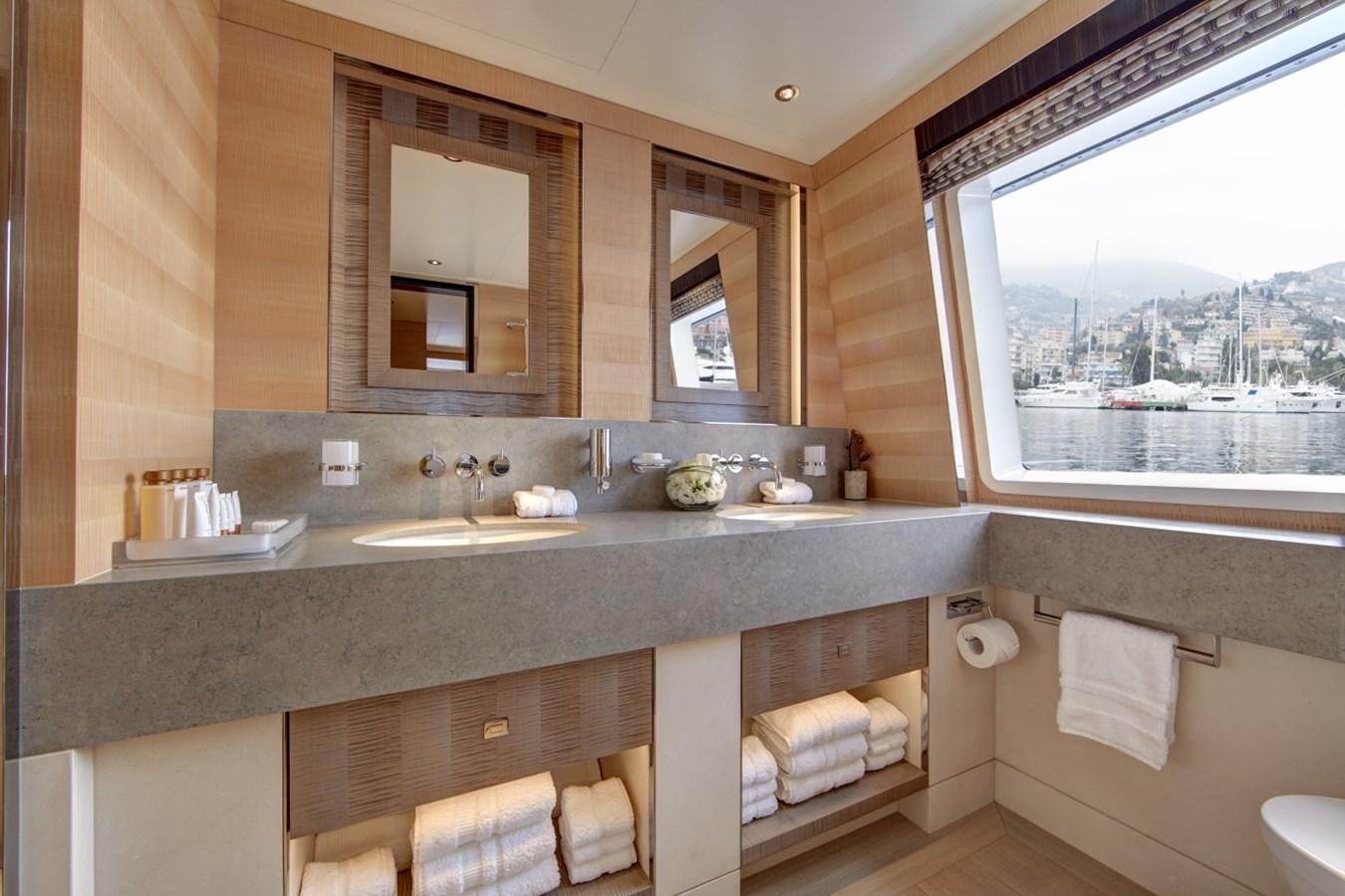 a bathroom with a large window aboard LADY VICTORIA Yacht for Sale