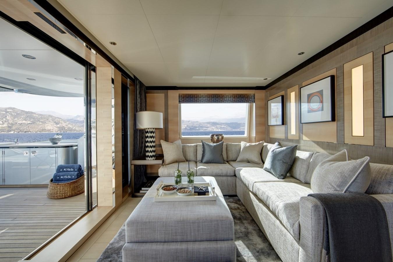 a living room with a large window aboard LADY VICTORIA Yacht for Sale