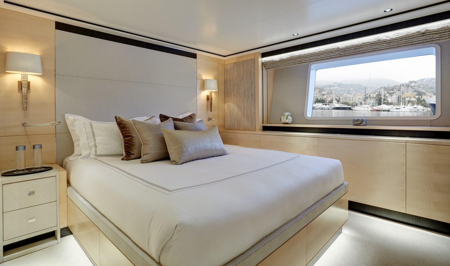 a bed in a room aboard LADY VICTORIA Yacht for Sale