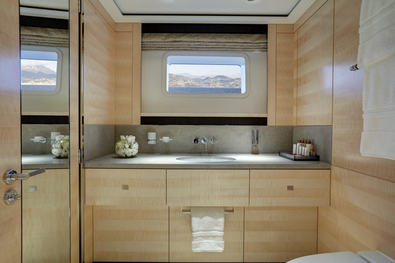a bathroom with a large window aboard LADY VICTORIA Yacht for Sale