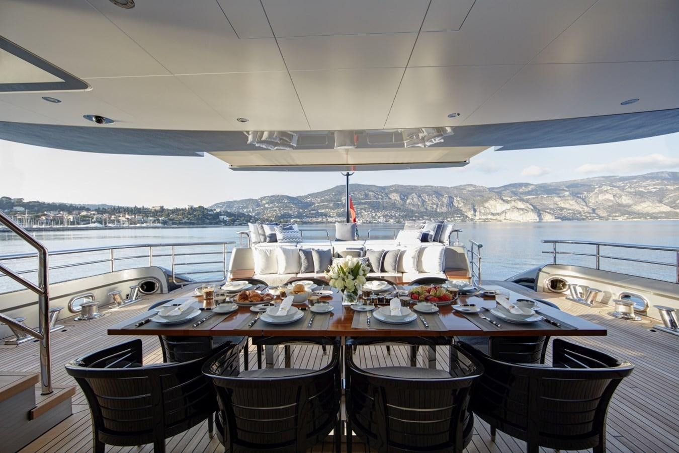 a table set for a meal on a boat aboard LADY VICTORIA Yacht for Sale