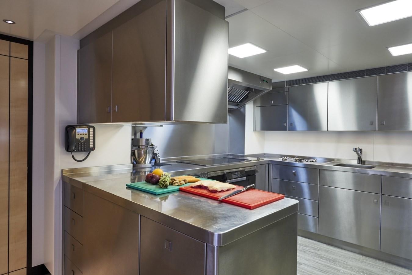 a kitchen with a countertop aboard LADY VICTORIA Yacht for Sale
