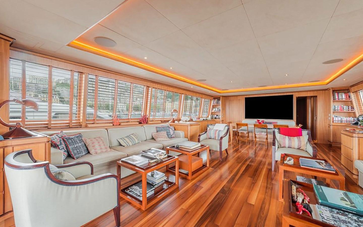 a living room with a large window aboard ANGRA TOO Yacht for Sale
