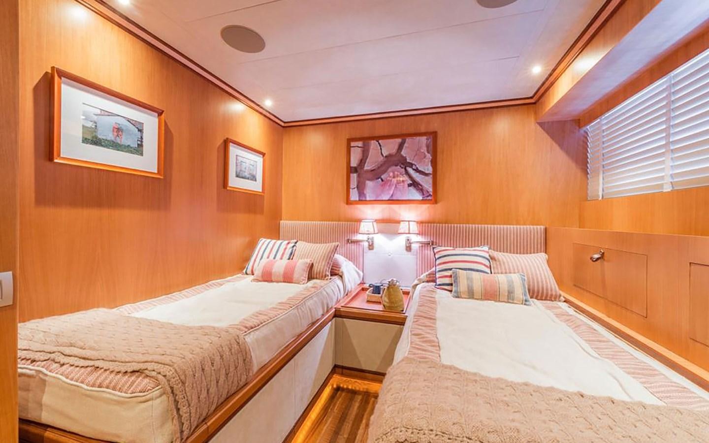 a room with two beds aboard ANGRA TOO Yacht for Sale