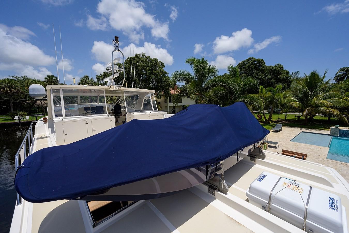a boat docked at a pier aboard BELLA Yacht for Sale