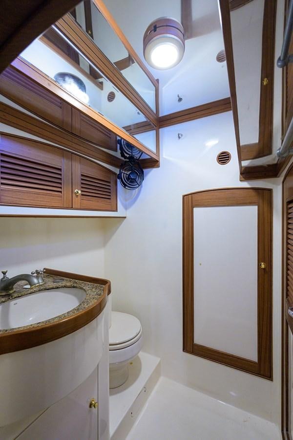 a bathroom with a sink and a toilet aboard BELLA Yacht for Sale
