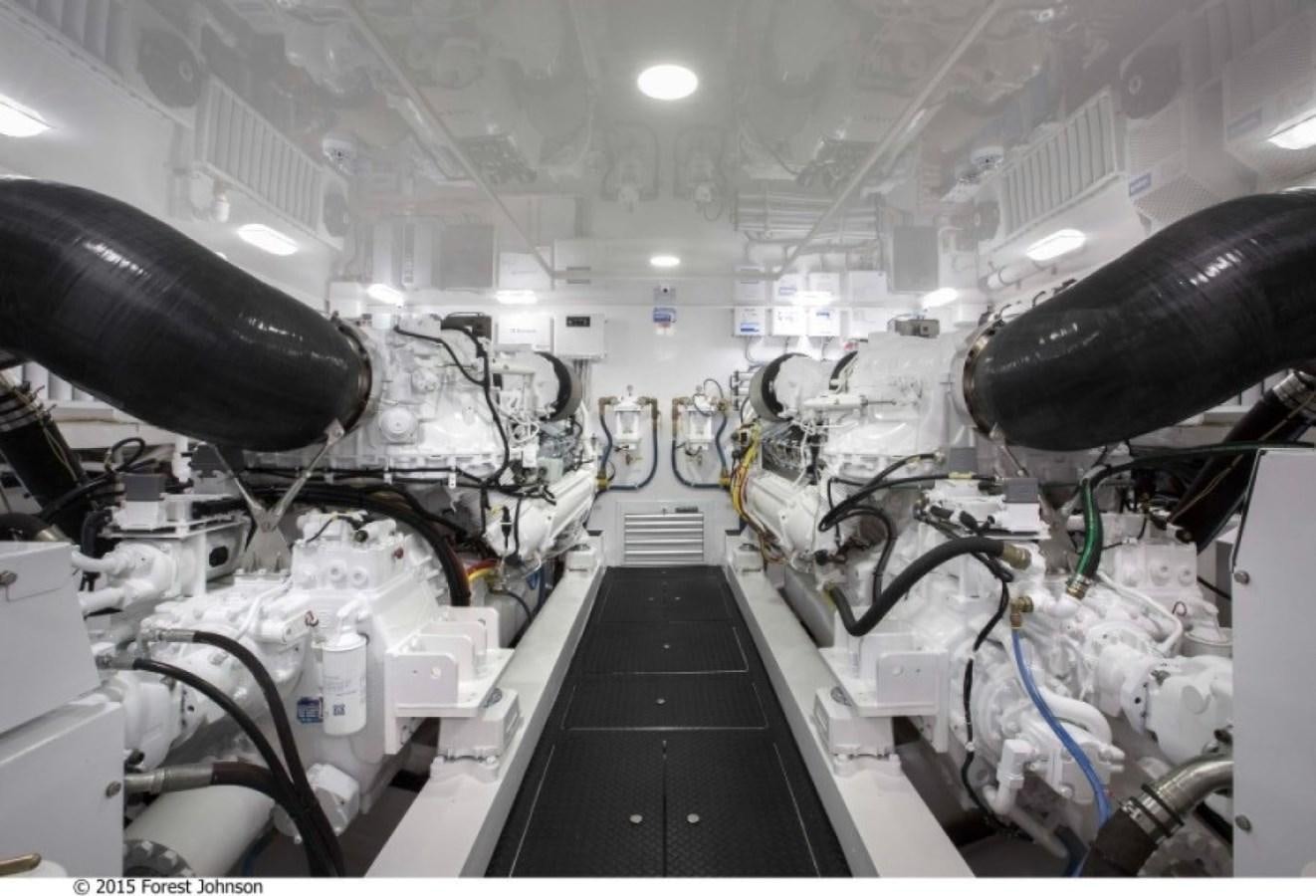 a large machine in a factory aboard NEW VIKING 80 ENCLOSED BRIDGE Yacht for Sale