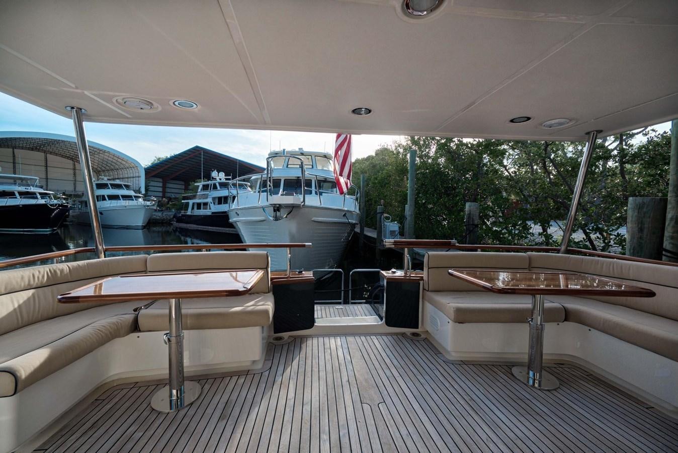 a boat dock with boats aboard BEN'S BARGE Yacht for Sale