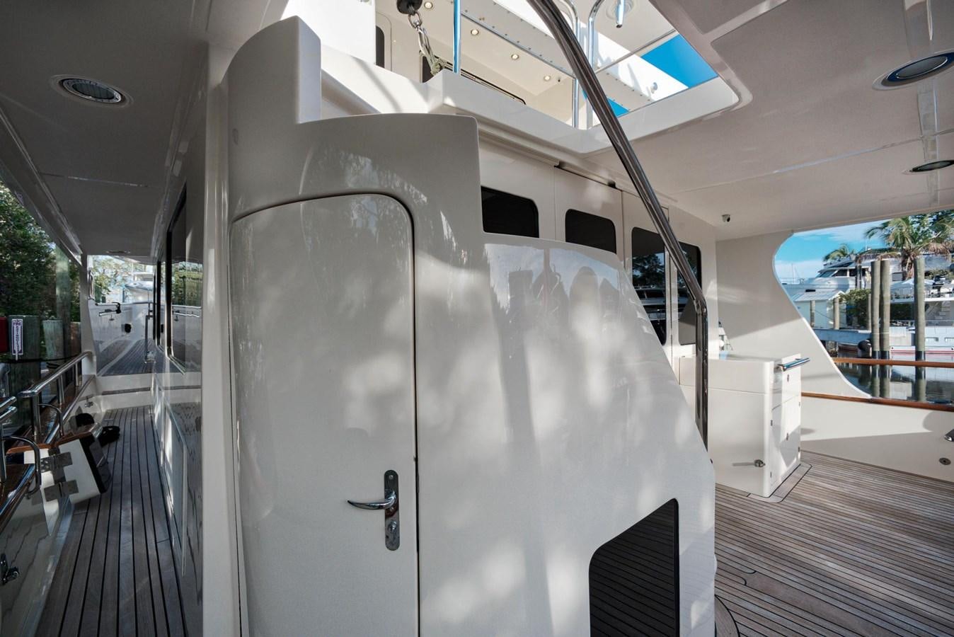 a large white object with a black handle on a wooden surface aboard BEN'S BARGE Yacht for Sale