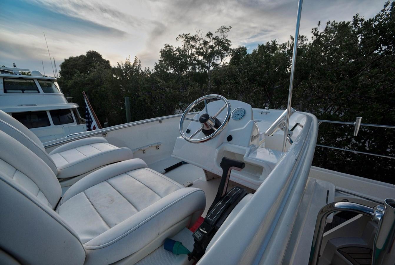 a person driving a car aboard BEN'S BARGE Yacht for Sale